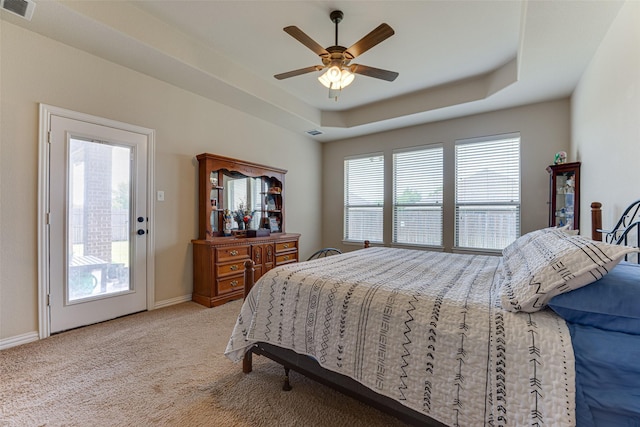 109 Thoroughbred St, Waxahachie, TX 75165 - bedroom with light carpet, visible vents, baseboards, and a raised ceiling
