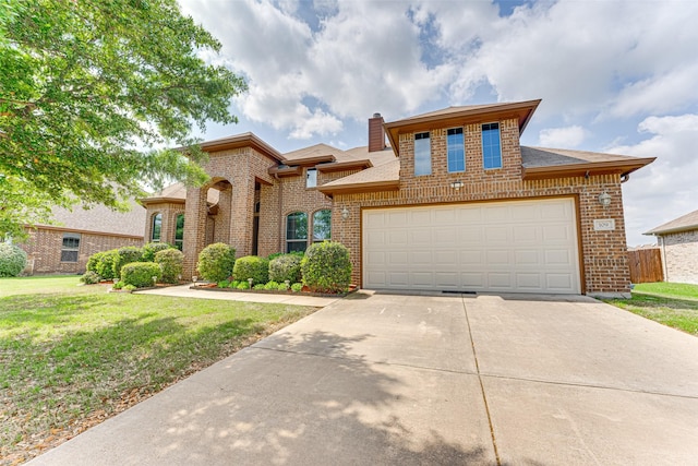 109 Thoroughbred St, Waxahachie, TX 75165 - view of front of house with a front yard, brick siding, and driveway