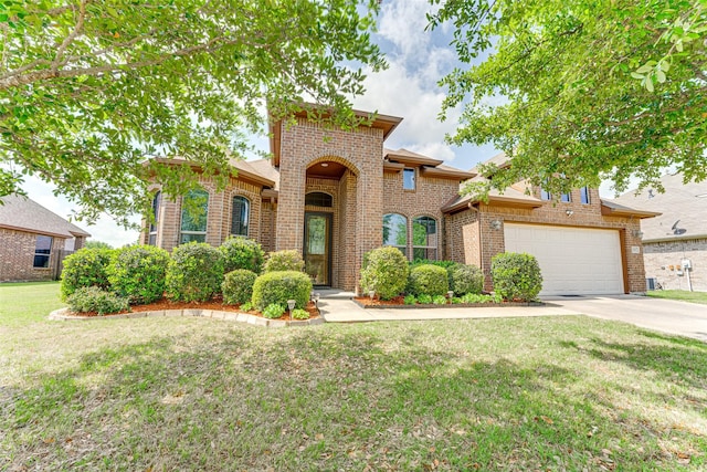 109 Thoroughbred St, Waxahachie, TX 75165 - view of front of house with a garage, a front yard, brick siding, and driveway