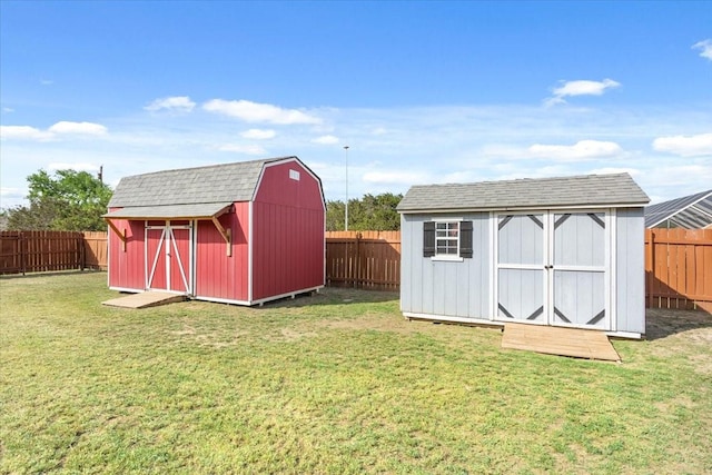 view of shed featuring a fenced backyard