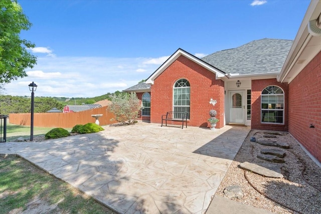 view of patio with fence