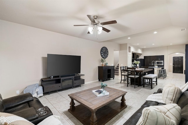 500 Harding Ln, Lavon, TX 75166 - living room featuring ceiling fan, arched walkways, light tile patterned floors, and recessed lighting
