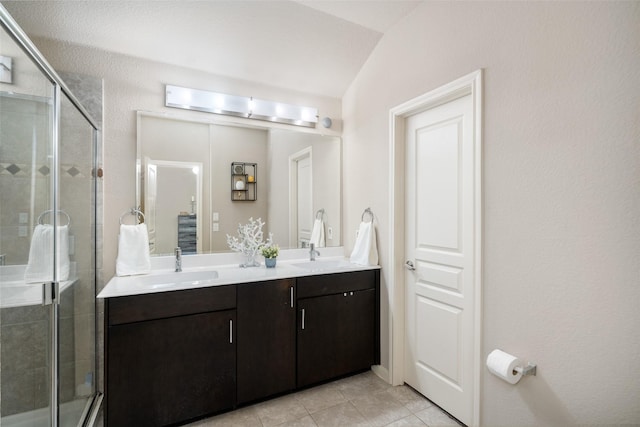 500 Harding Ln, Lavon, TX 75166 - bathroom with double vanity, a shower stall, and tile patterned floors