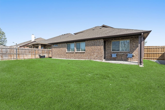 500 Harding Ln, Lavon, TX 75166 - back of house featuring brick siding and a shingled roof