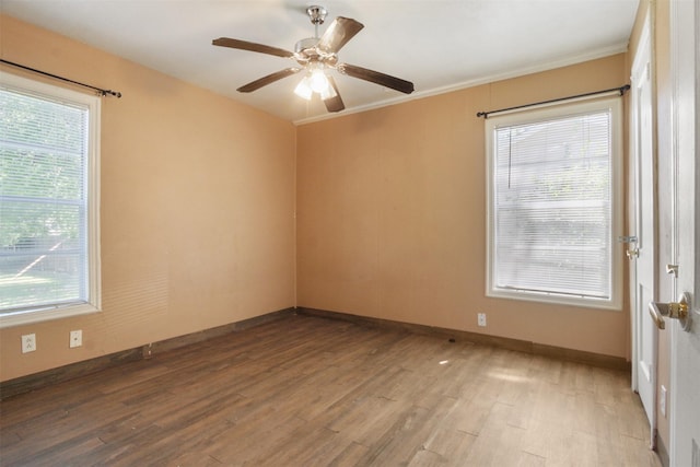 120 N Las Vegas Trl, White Settlement, TX 76108 - unfurnished room with wood finished floors, baseboards, and a wealth of natural light