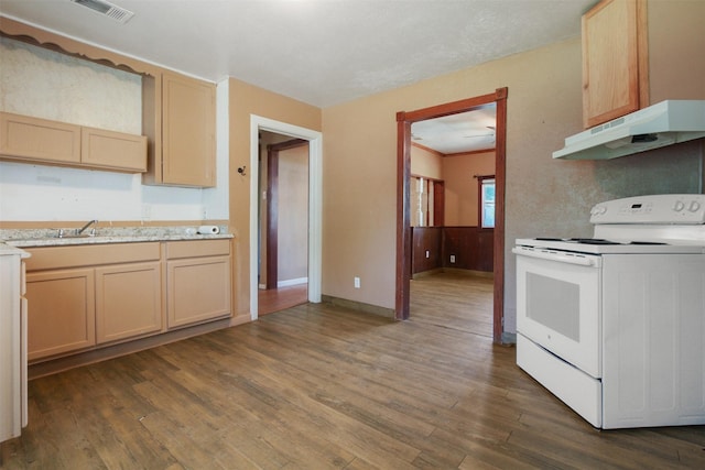 120 N Las Vegas Trl, White Settlement, TX 76108 - kitchen with visible vents, under cabinet range hood, dark wood-style flooring, light countertops, and white electric stove