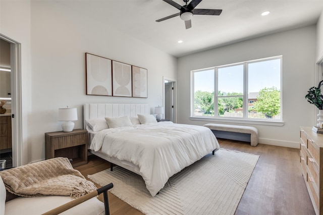 7312 Flyers Way, Dallas, TX 75235 - bedroom with light wood finished floors, recessed lighting, baseboards, and a ceiling fan