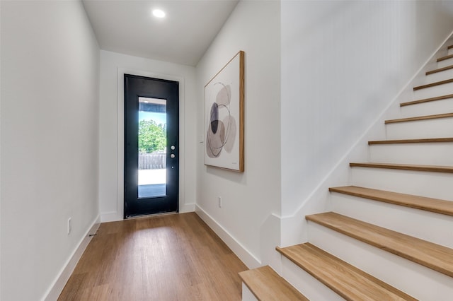 7312 Flyers Way, Dallas, TX 75235 - entryway with stairway, baseboards, wood finished floors, and recessed lighting