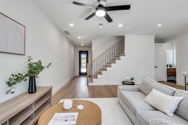 7312 Flyers Way, Dallas, TX 75235 - living room with wood finished floors, stairs, ceiling fan, recessed lighting, and baseboards