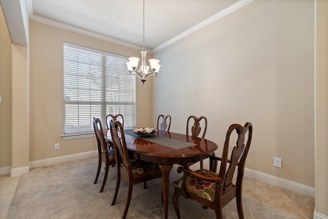 dining room with crown molding, baseboards, an inviting chandelier, and light carpet