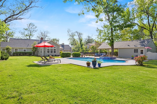 view of swimming pool featuring a lawn, outdoor lounge area, fence, and a patio