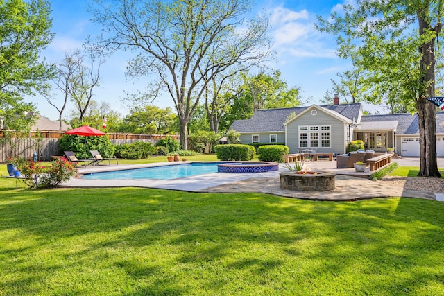 view of pool with fence, a lawn, an outdoor living space with a fire pit, and a patio area