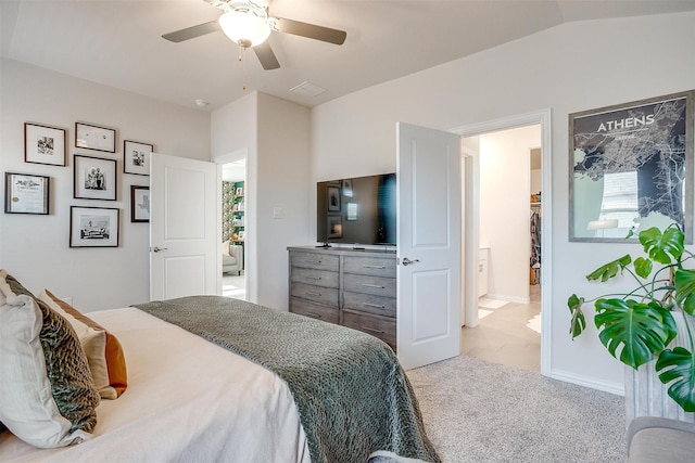 carpeted bedroom with ceiling fan, baseboards, multiple windows, and lofted ceiling