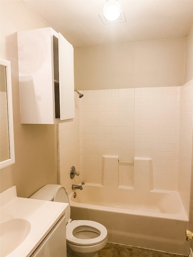 502 E Ross St, Waxahachie, TX 75165 - bathroom featuring tile patterned floors, vanity, toilet, and tub / shower combination