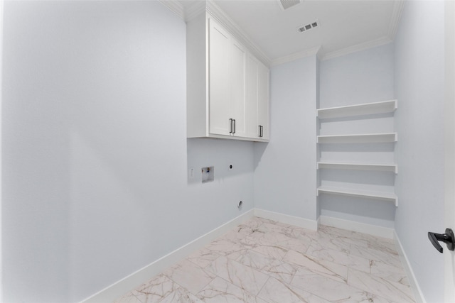 laundry area with hookup for an electric dryer, crown molding, visible vents, cabinet space, and marble finish floor