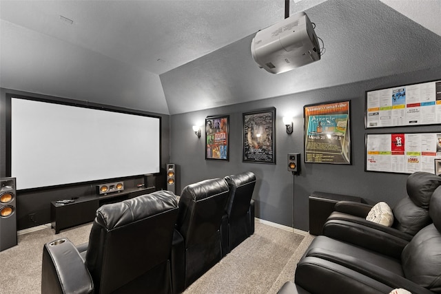 home theater featuring a textured ceiling, lofted ceiling, carpet, and a wall mounted AC