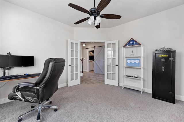 carpeted office featuring a ceiling fan, french doors, and baseboards