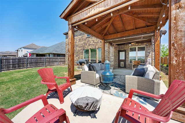 view of patio / terrace featuring a gazebo, outdoor lounge area, and a fenced backyard