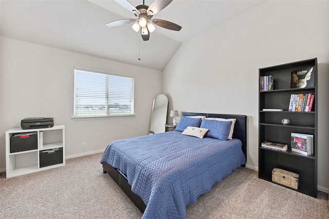 bedroom featuring a ceiling fan, carpet flooring, vaulted ceiling, and baseboards