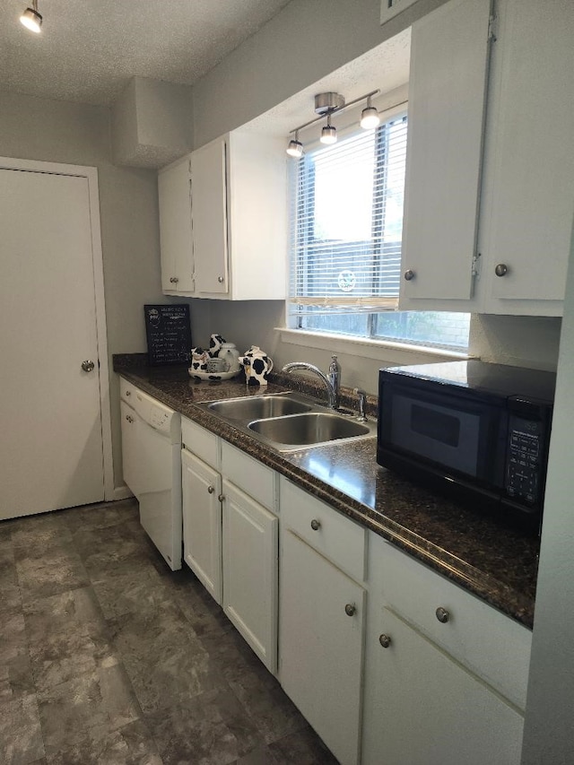 4614 Country Creek Dr Unit 1167, Dallas, TX 75236 - kitchen with white dishwasher, black microwave, white cabinetry, and a sink