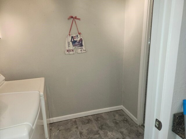 4614 Country Creek Dr Unit 1167, Dallas, TX 75236 - clothes washing area with baseboards and laundry area