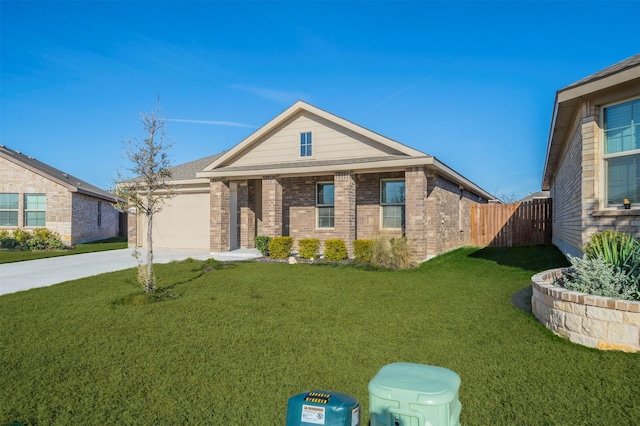 ranch-style house featuring an attached garage, driveway, fence, and a front lawn