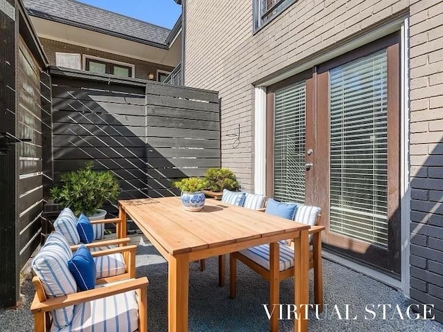 10109 Regal Park Ln Unit 117, Dallas, TX 75230 - balcony with outdoor dining space