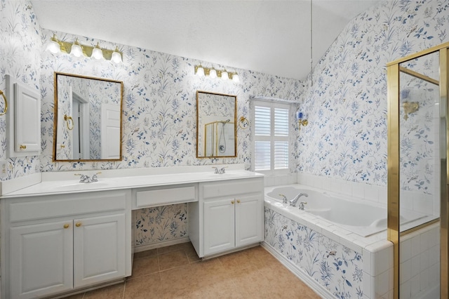 5320 Big Bend Dr, Fort Worth, TX 76137 - bathroom featuring wallpapered walls, a stall shower, tile patterned flooring, a bath, and a sink