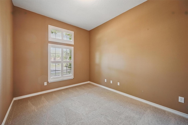 5320 Big Bend Dr, Fort Worth, TX 76137 - carpeted spare room featuring plenty of natural light and baseboards