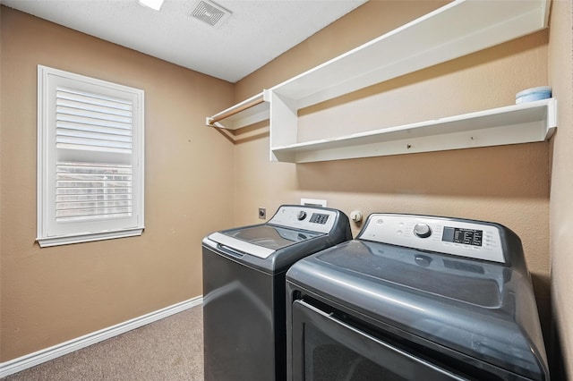 5320 Big Bend Dr, Fort Worth, TX 76137 - clothes washing area featuring baseboards, carpet floors, visible vents, laundry area, and washing machine and clothes dryer