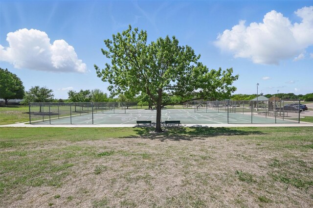 5320 Big Bend Dr, Fort Worth, TX 76137 - view of sport court featuring fence and a lawn