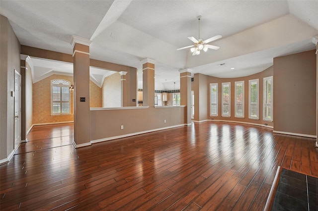 5320 Big Bend Dr, Fort Worth, TX 76137 - unfurnished living room featuring decorative columns, a ceiling fan, vaulted ceiling, baseboards, and hardwood / wood-style flooring