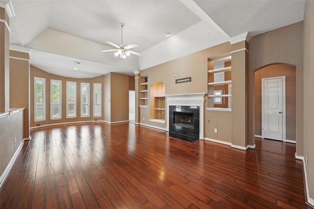 5320 Big Bend Dr, Fort Worth, TX 76137 - unfurnished living room with built in shelves, ceiling fan, and baseboards