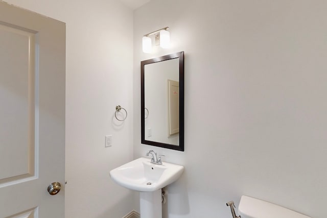 2812 Bluejack Rd, Mckinney, TX 75071 - bathroom with toilet and a sink