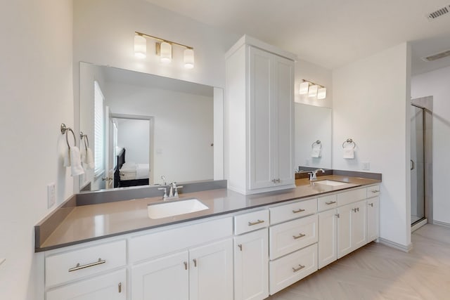 2812 Bluejack Rd, Mckinney, TX 75071 - ensuite bathroom featuring double vanity and a stall shower