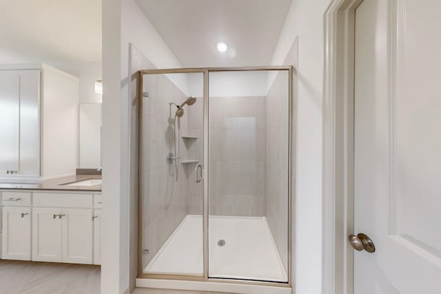 2812 Bluejack Rd, Mckinney, TX 75071 - bathroom with a stall shower, vanity, and recessed lighting