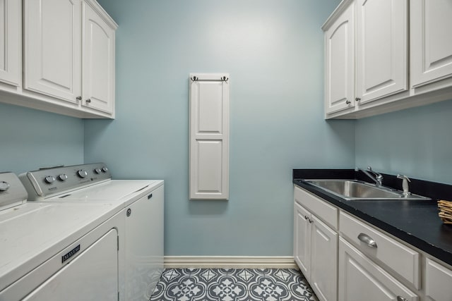 1318 Amsterdam Ct, Granbury, TX 76048 - clothes washing area featuring independent washer and dryer, cabinet space, baseboards, and light tile patterned floors