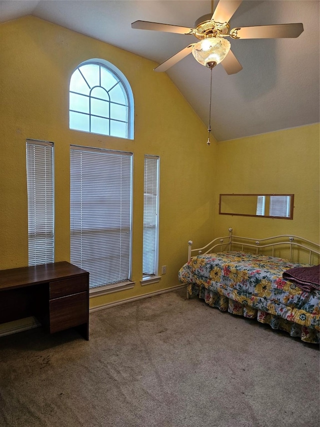 carpeted bedroom featuring high vaulted ceiling and ceiling fan