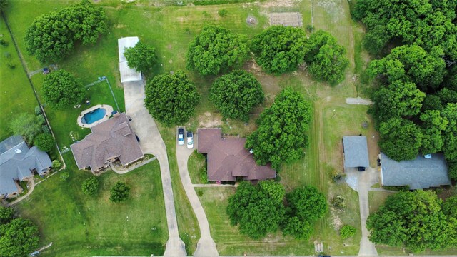 view of front of home featuring a front lawn and brick siding