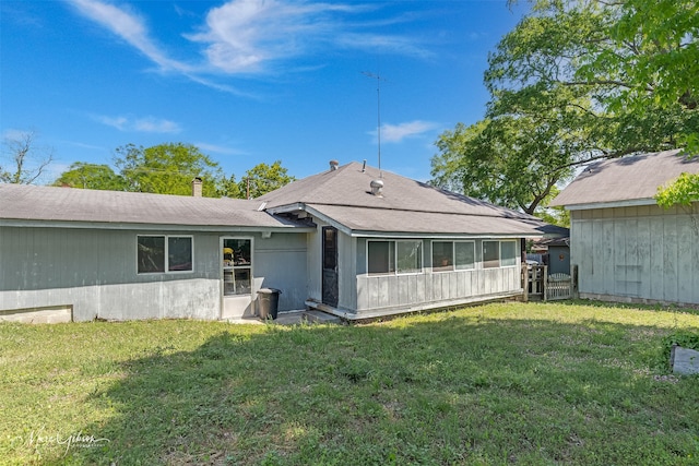 723 N Main St, Homer, LA 71040 - rear view of property featuring a yard, a shingled roof, and a chimney