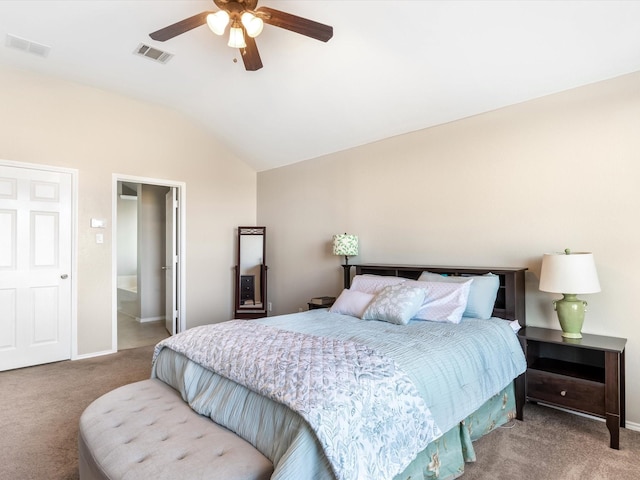 bedroom with baseboards, lofted ceiling, visible vents, and carpet