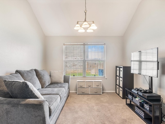 living room featuring lofted ceiling, carpet, baseboards, and an inviting chandelier