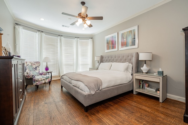 bedroom with dark wood-style floors, visible vents, recessed lighting, ceiling fan, and crown molding