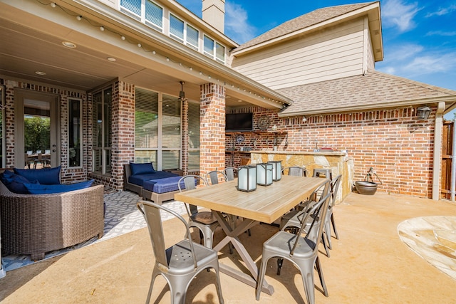 view of patio featuring outdoor lounge area and outdoor dining space
