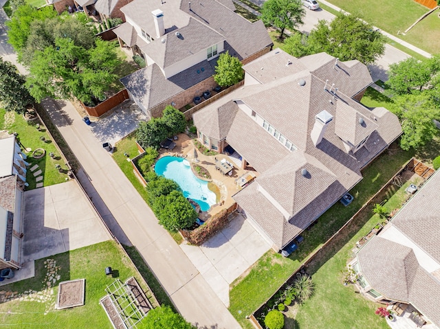 birds eye view of property with a residential view