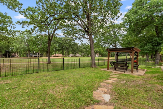 view of yard featuring a gazebo and fence