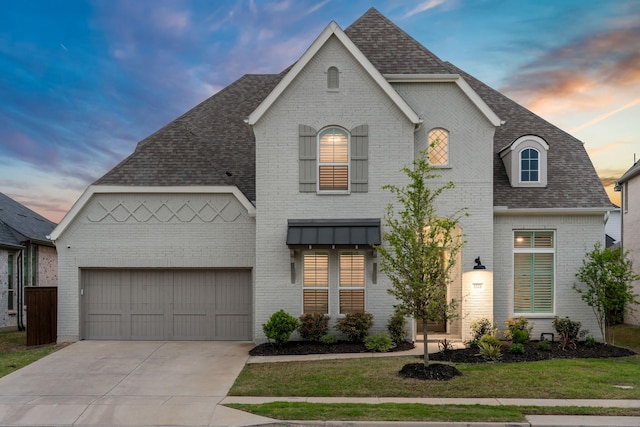 3221 Sunday Silence Ln, Celina, TX 75009 - pool at dusk featuring an outdoor living space, a patio area, a pool with connected hot tub, and fence