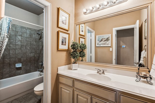full bathroom featuring shower / tub combo with curtain, vanity, and toilet