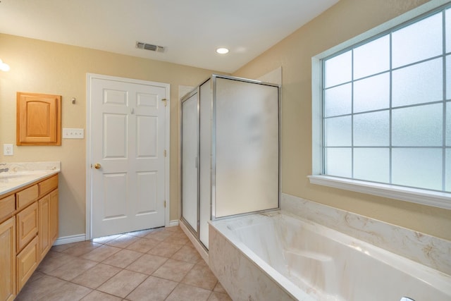 6424 County Road 176, Stephenville, TX 76401 - full bathroom featuring visible vents, a wealth of natural light, vanity, and a stall shower