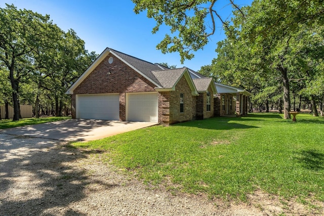 6424 County Road 176, Stephenville, TX 76401 - view of front of house featuring concrete driveway, a front lawn, fence, a garage, and brick siding